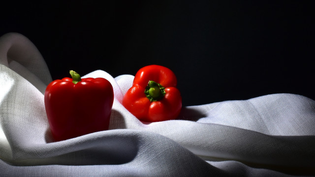 Red peppers white tablecloth black free wallpaper for desktop - medium preview image