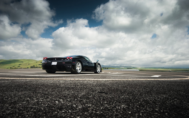 Black sports car cloudy sky #4 free wallpaper for desktop - medium preview image