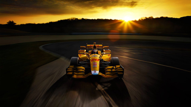 Yellow race car sunset landscape free wallpaper for desktop - medium preview image