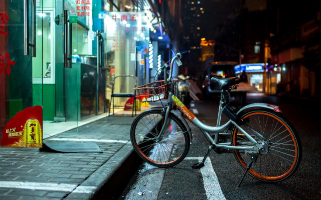 Bicycle street night neon building free wallpaper for desktop - medium preview image
