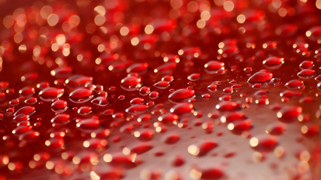 Red liquid water drops macro free wallpaper for desktop - medium preview image