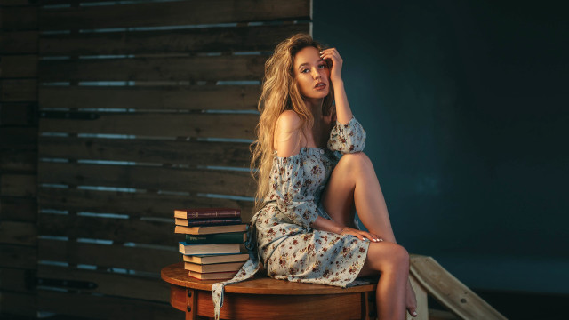 Woman sitting books floral dress free wallpaper for desktop - medium preview image
