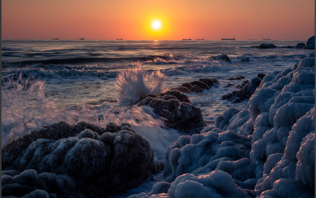 Sunset ocean waves rocks boat free wallpaper for desktop - medium preview image