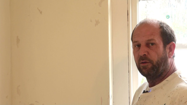 Man standing window white shirt free wallpaper for desktop - medium preview image