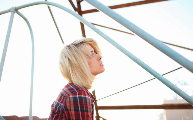 Blonde woman metal structure sky free wallpaper for desktop - medium preview image