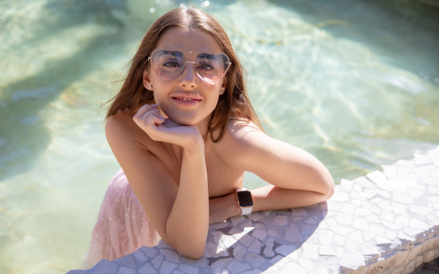 Girl glasses sitting pool smile free wallpaper for desktop - medium preview image