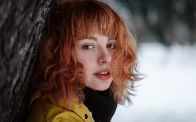 Redhead woman leaning tree snow free wallpaper for desktop - medium preview image