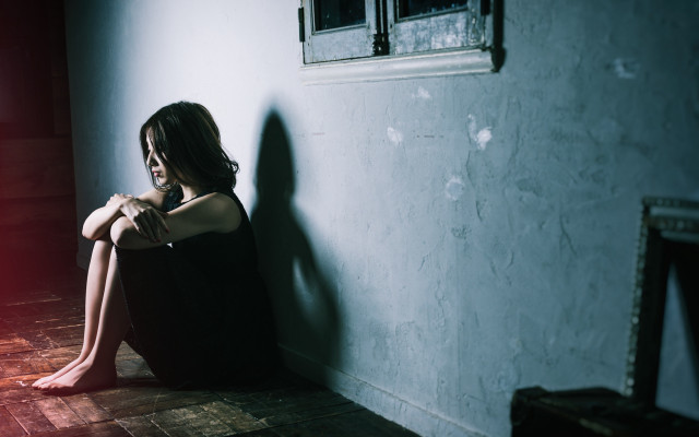 Woman sitting red light room free wallpaper for desktop - medium preview image