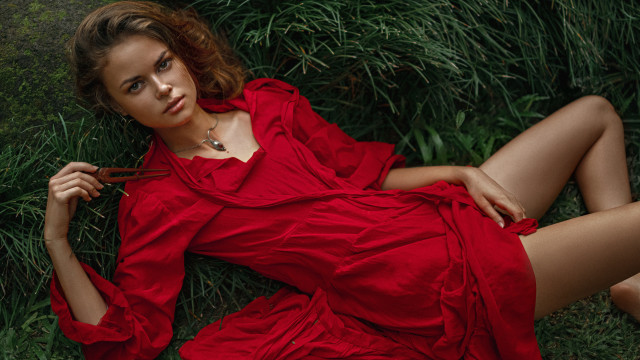 Woman red dress lying nature free wallpaper for desktop - medium preview image