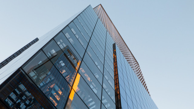 Tall building yellow light cityscape free wallpaper for desktop - medium preview image