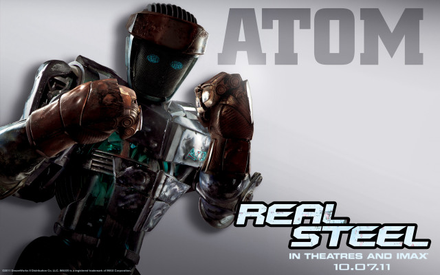 Robot holding gun real steel free wallpaper for desktop - medium preview image