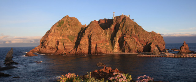 Rock lighthouse pier ocean cloudscape free wallpaper for desktop - medium preview image