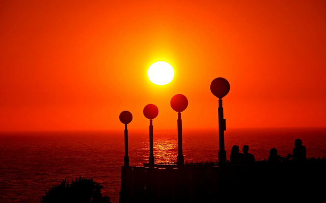 Sunset people bench ocean lighthouse free wallpaper for desktop - medium preview image