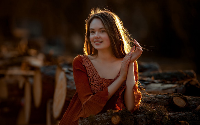Woman smiling forest red dress free wallpaper for desktop - medium preview image