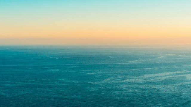 Ocean plane sunset minimalism tiltshift free wallpaper for desktop - medium preview image