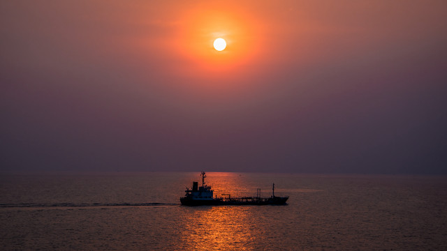 Boat sailing ocean sunset moon free wallpaper for desktop - medium preview image