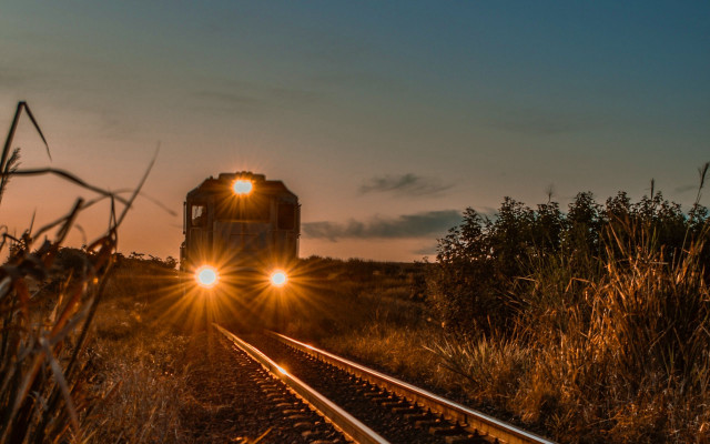 Train sunset lights flare silhouette free wallpaper for desktop - medium preview image