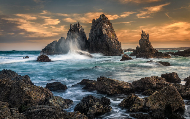 Rocky beach sunset waves clouds free wallpaper for desktop - medium preview image