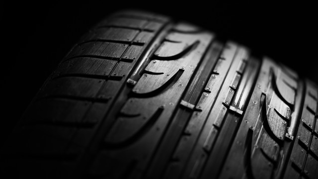 Tire closeup black background macro free wallpaper for desktop - medium preview image