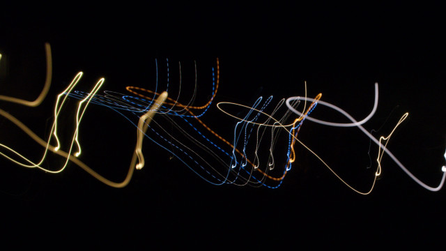 Blurry black background light lines free wallpaper for desktop - medium preview image