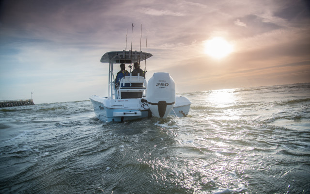 Beach sunset boat people mountains free wallpaper for desktop - medium preview image