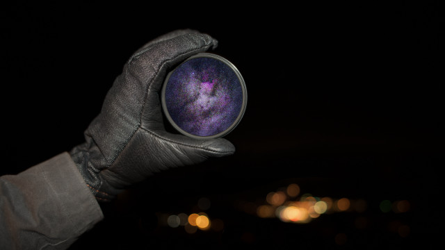 Hand holding galaxy holography astrophotography free wallpaper for desktop - medium preview image