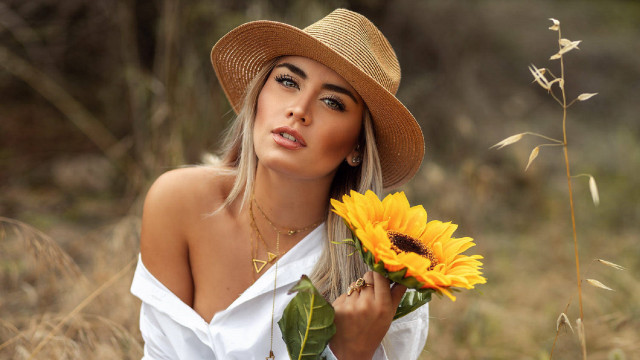 Woman hat sunflower field bouquet free wallpaper for desktop - medium preview image