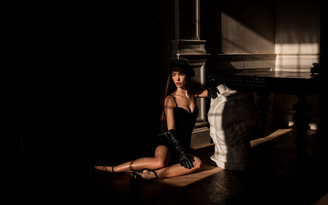 Woman black dress dark room free wallpaper for desktop - medium preview image