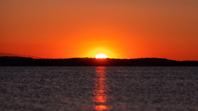 Sunset horizon water boat trees free wallpaper for desktop - medium preview image