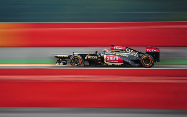 Black gold race car motion free wallpaper for desktop - medium preview image