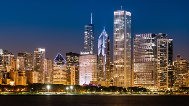 City skyline night skyscrapers reflections free wallpaper for desktop - medium preview image