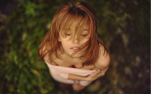 Red haired woman phone blurry free wallpaper for desktop - medium preview image