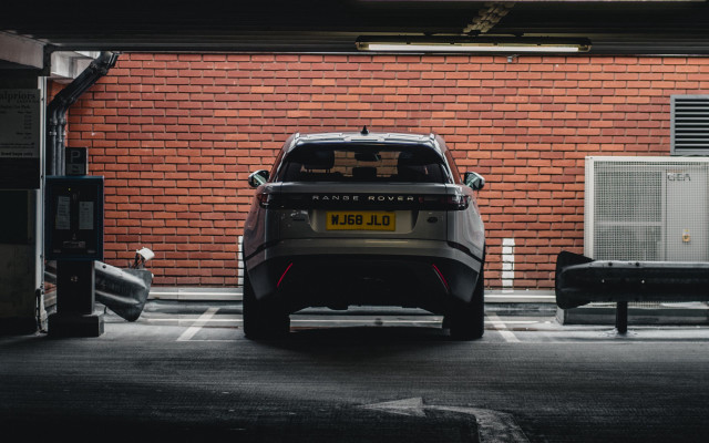 Car parking lot brick wall free wallpaper for desktop - medium preview image