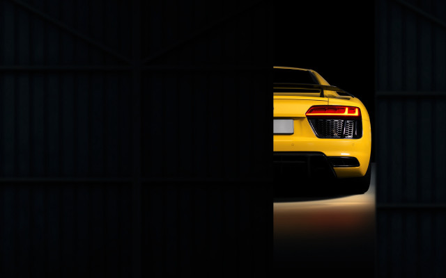 Yellow sports car dark doorway free wallpaper for desktop - medium preview image