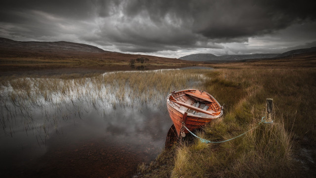 Boat water cloudy mountains sunset free wallpaper for desktop - medium preview image