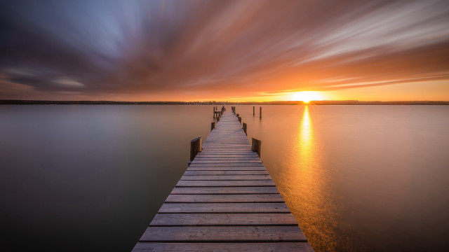 Sunset dock pier ocean reflection free wallpaper for desktop - medium preview image