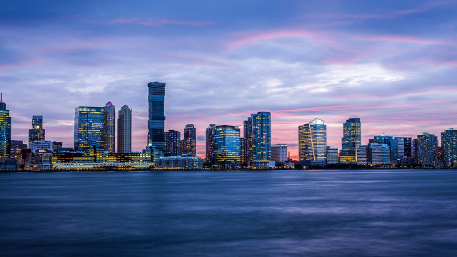 City skyline dusk water reflection free wallpaper for desktop - medium preview image