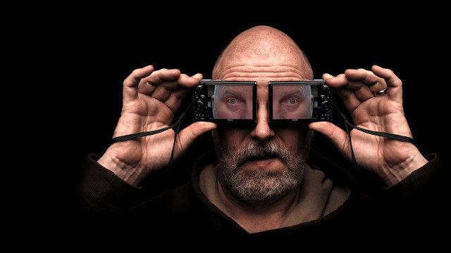 Man holding phone glasses hyperrealism free wallpaper for desktop - medium preview image