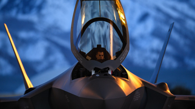 Fighterjet cockpit night mountains blonde free wallpaper for desktop - medium preview image