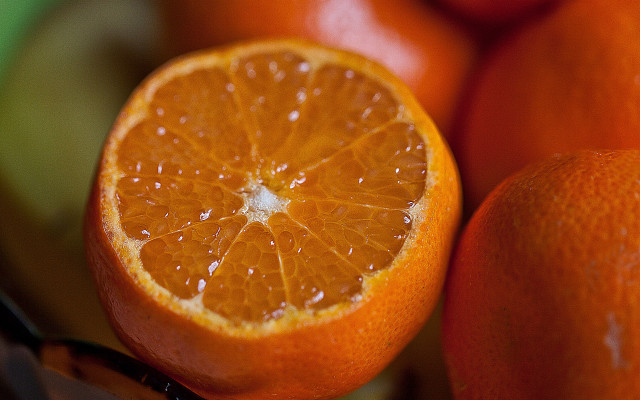 Orange closeup slice background macro free wallpaper for desktop - medium preview image