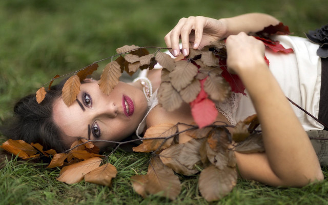 Woman lying grass leaves hair free wallpaper for desktop - medium preview image