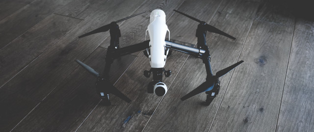 Remote controlled black white drone free wallpaper for desktop - medium preview image
