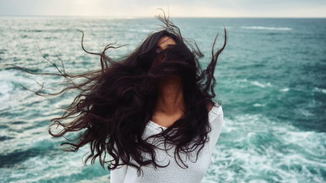 Woman long hair boat ocean free wallpaper for desktop - medium preview image