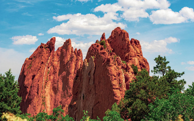 Large rock formation forest blue free wallpaper for desktop - medium preview image