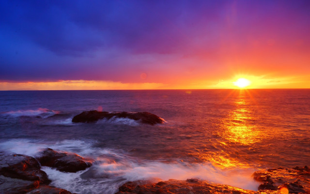 Sunset ocean waves rocks citylights free wallpaper for desktop - medium preview image