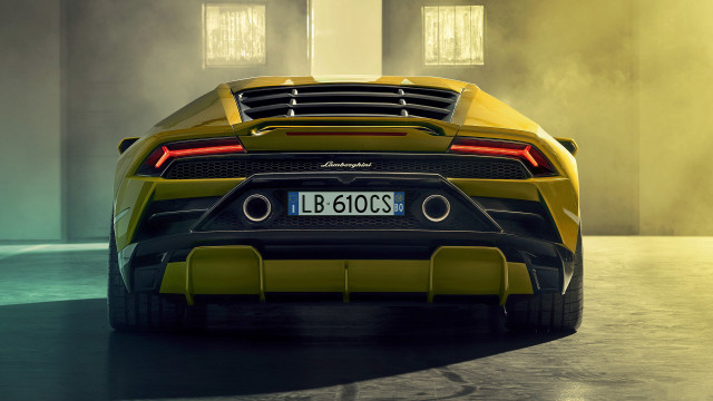 Yellow sports car foggy garage free wallpaper for desktop - medium preview image