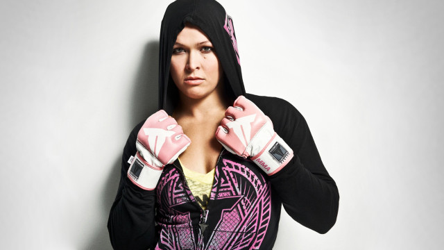 Woman pink gloves black hoodie free wallpaper for desktop - medium preview image