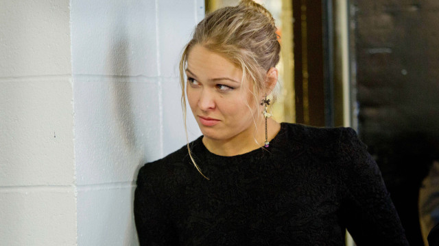 Woman standing white wall cell free wallpaper for desktop - medium preview image