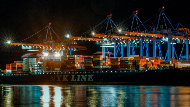 Cargo ship containers night cityscape free wallpaper for desktop - medium preview image