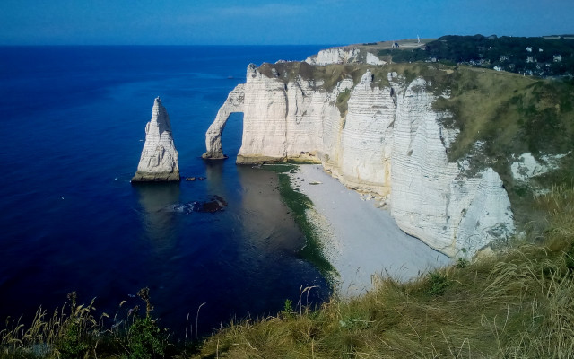 Large water rocky cliff boat free wallpaper for desktop - medium preview image